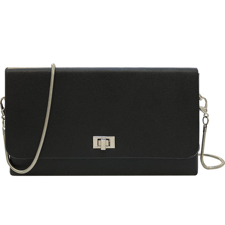 Women's clutch bag with elegant flap closure and innovative design