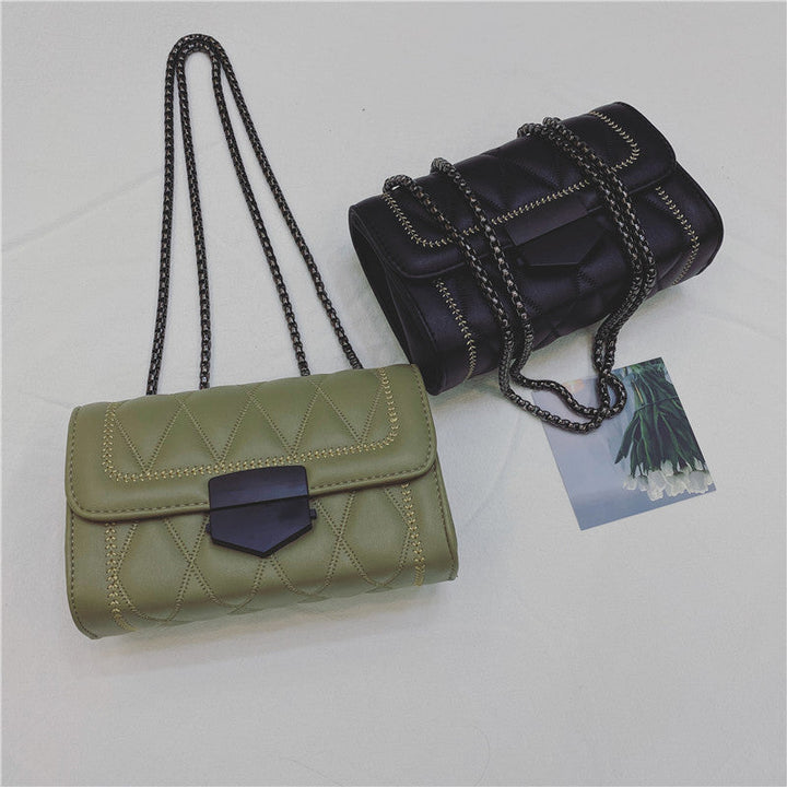 Women's clutch with stylish quilted design and detachable chain strap