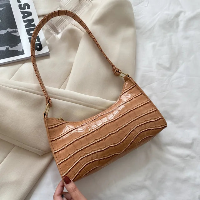 Women's leather shoulder bag in retro style