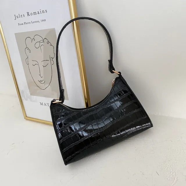 Women's leather shoulder bag in retro style