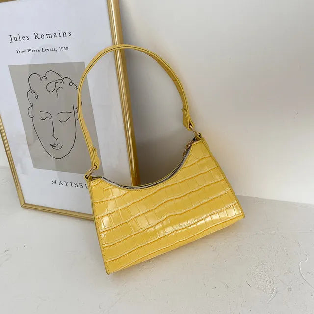 Women's leather shoulder bag in retro style