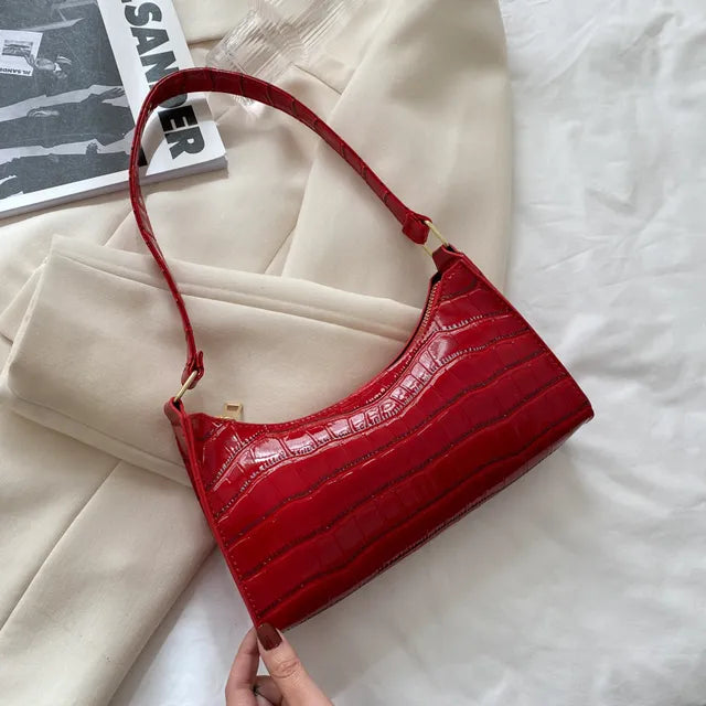Women's leather shoulder bag in retro style