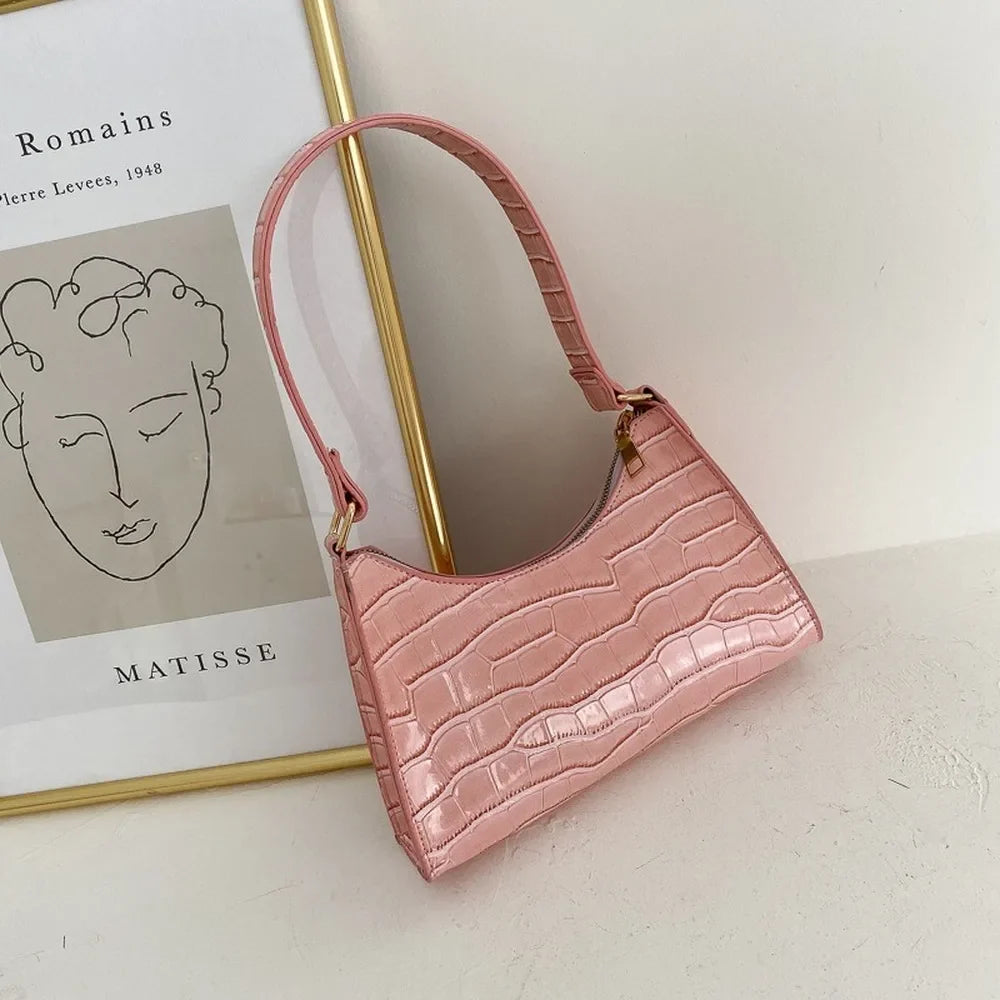 Women's leather shoulder bag in retro style