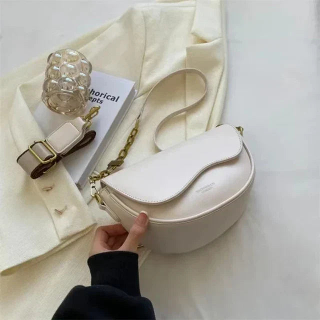 Women's shoulder bag made of PU leather with wide strap