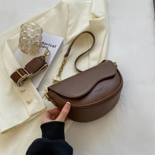 Women's shoulder bag made of PU leather with wide strap