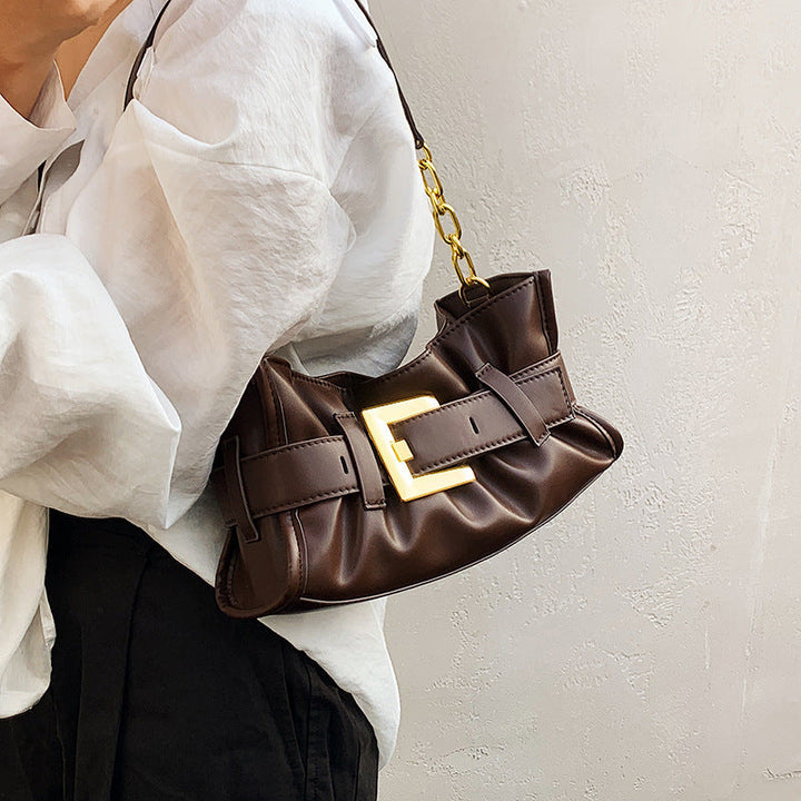 Women's crossbody bag with elegant chain accent and soft upper material