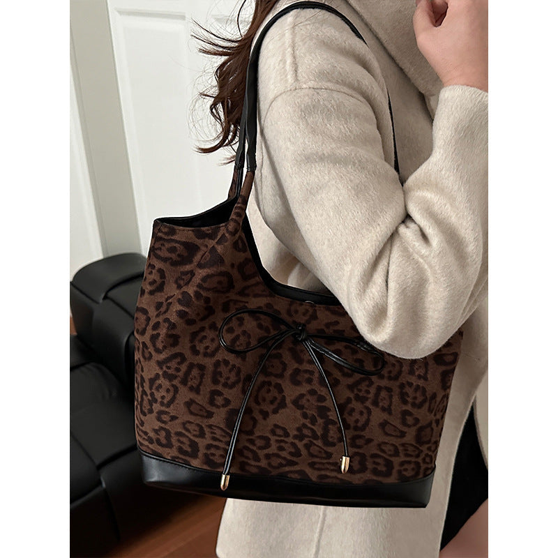 Women's tote bag with stylish leopard pattern and adjustable drawstring