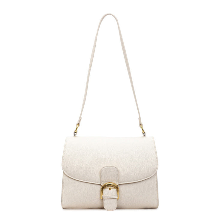 Ladies shoulder bag with elegant flap closure and decorative metal accent