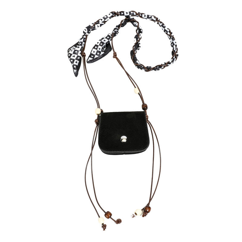 Women's mini handbag with adjustable chain strap and customizable design