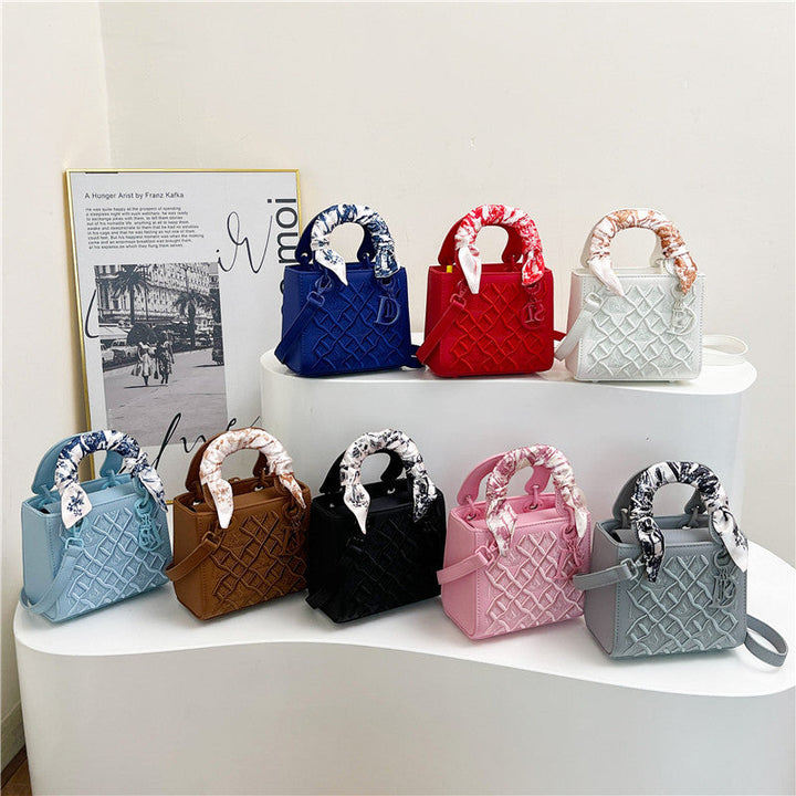 Ladies handbag with luxurious pattern
