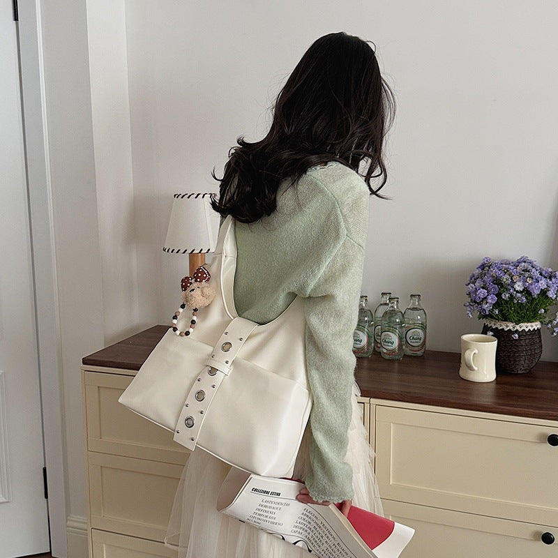 Ladies crossbody bag made of high-quality artificial leather with practical attachments
