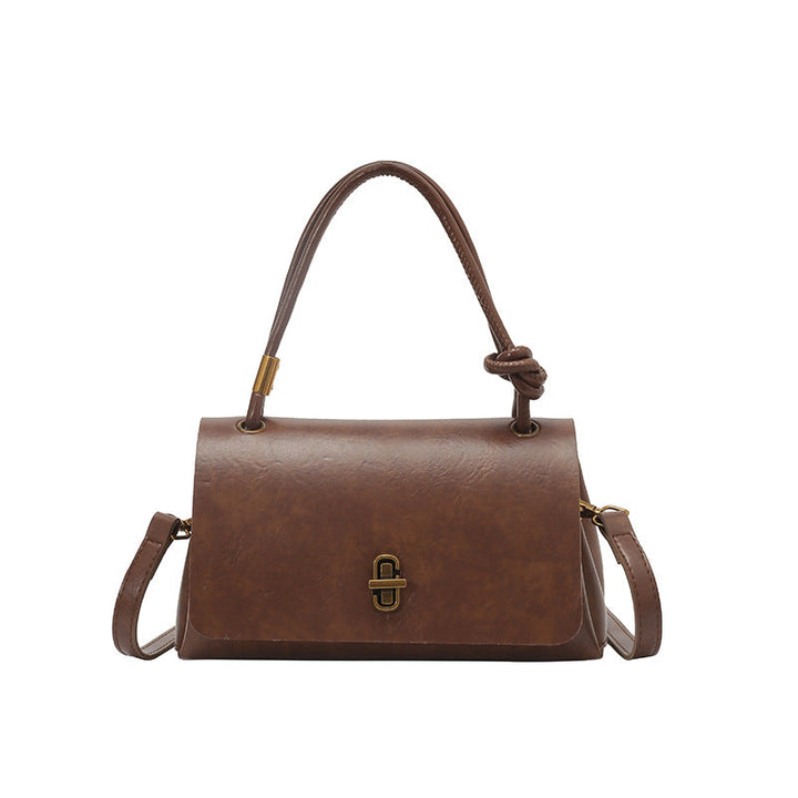 Women's elegant handbag with detachable shoulder strap