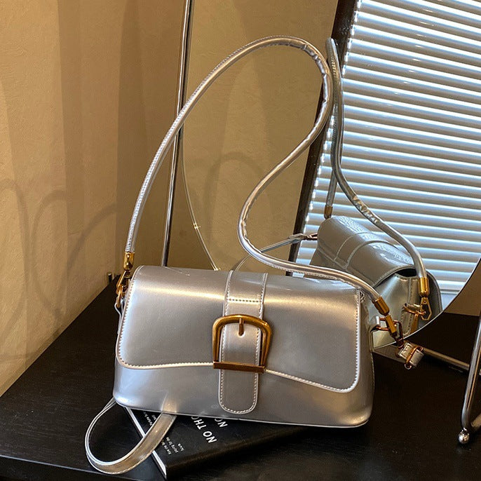 Women's shoulder bag with detachable strap and elegant closure