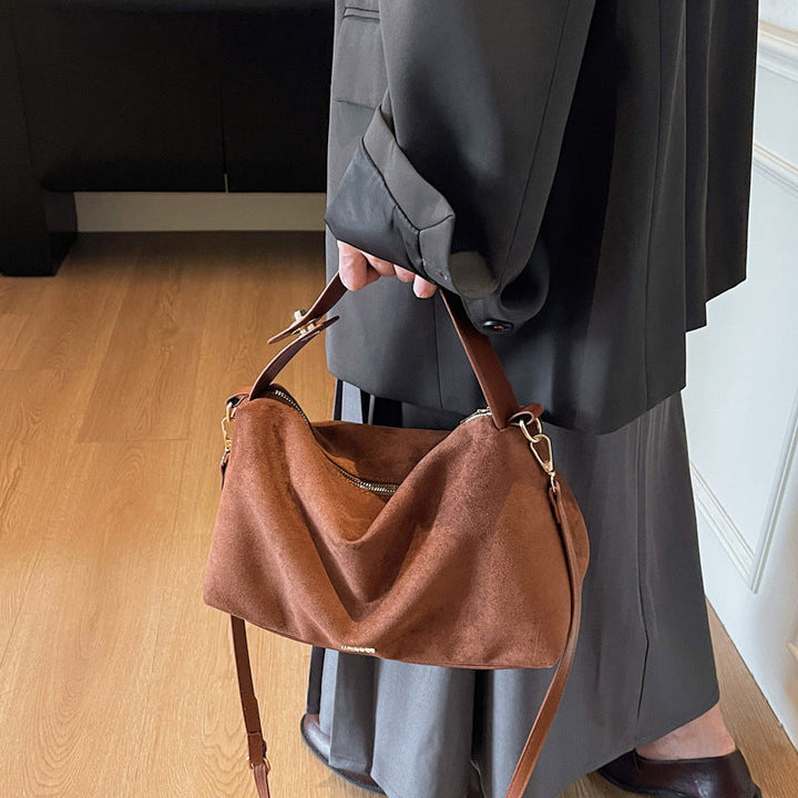Women's practical shoulder bag made of soft suede