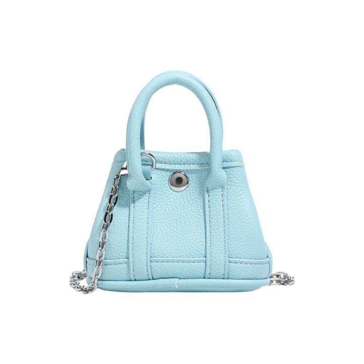 Ladies mini handbag with smooth structure and removable chain strap