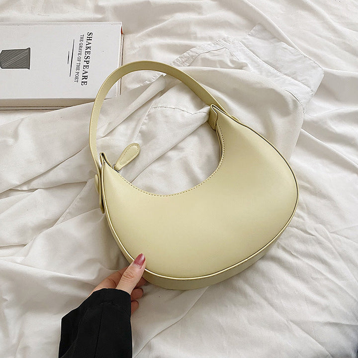 Women elegant shoulder bag with modern accents