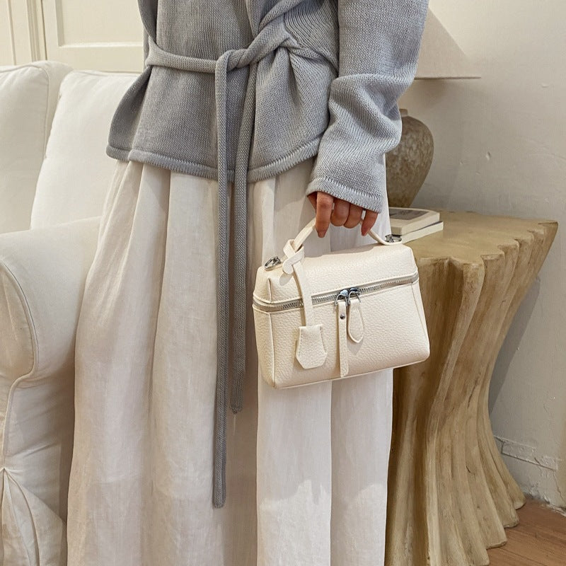 Women's practical shoulder bag with double zipper and versatile carrying strap