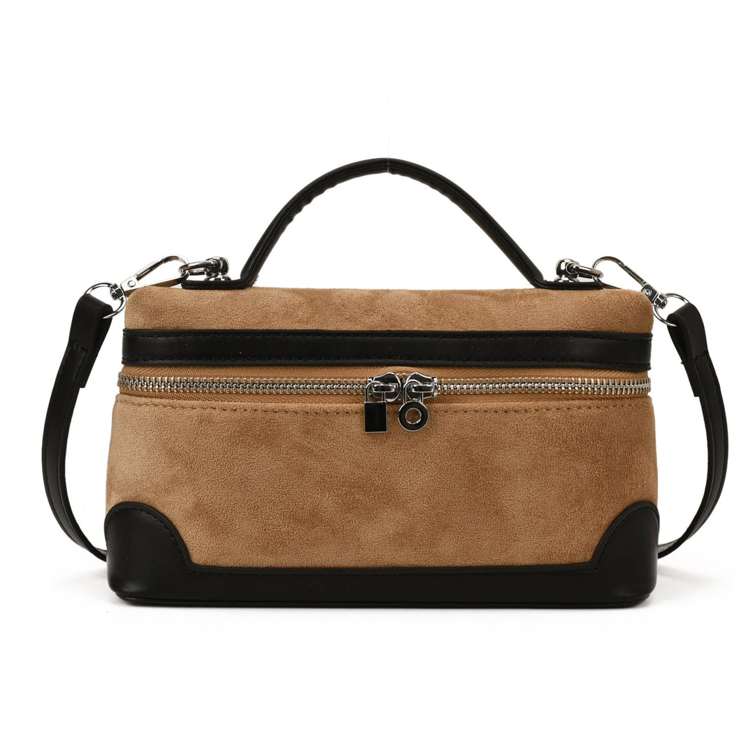 Women's shoulder bag made of soft suede leather with practical compartments
