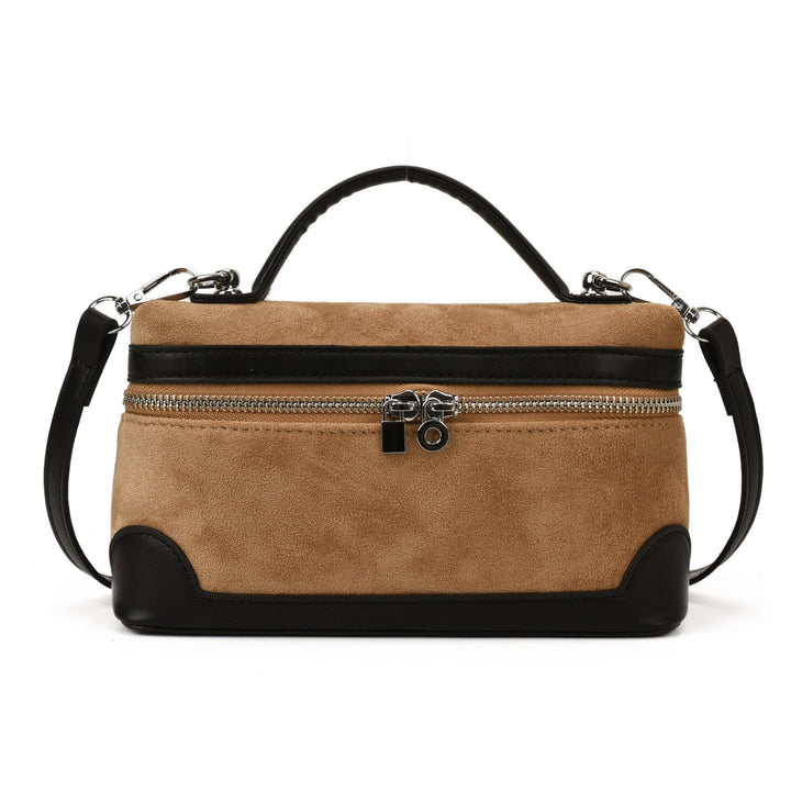 Women's shoulder bag made of soft suede leather with practical compartments