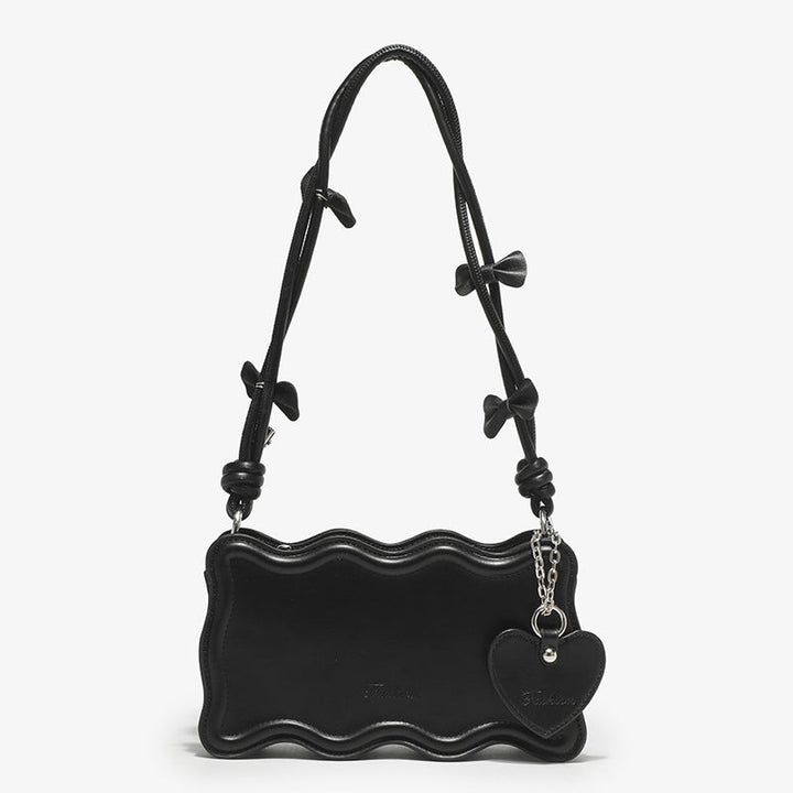 Women's mini handbag with creative wave pattern and playful pendant