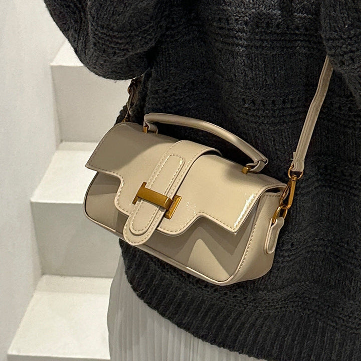 Ladies elegant mini handbag with practical carrying handle and removable shoulder strap