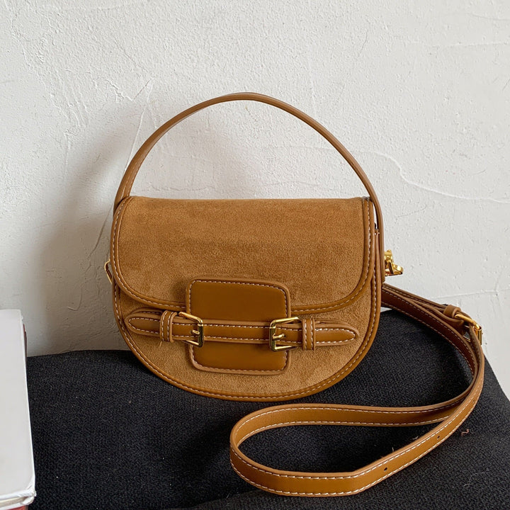Women's shoulder bag made of high-quality suede with elegant chain closure
