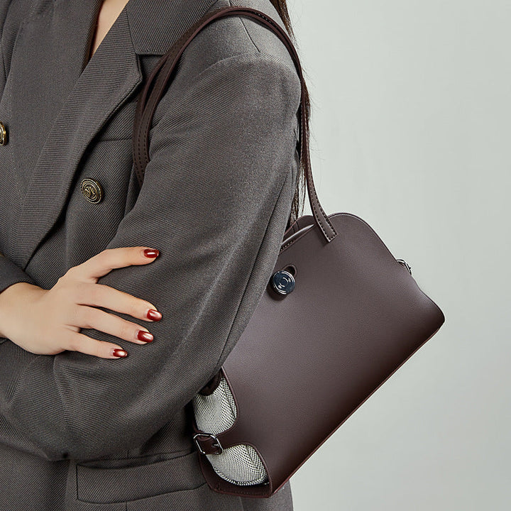 Women's tote bag with stylish design and practical compartments