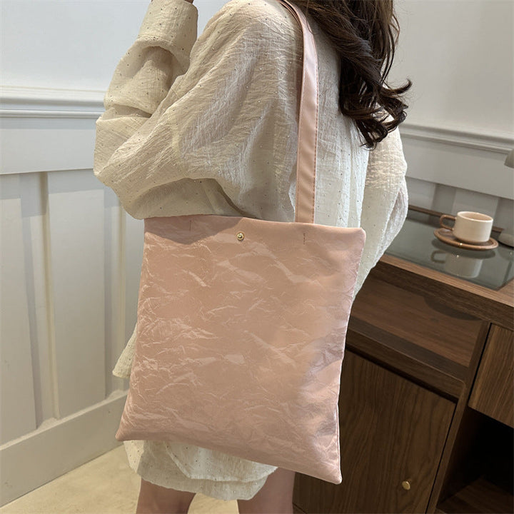 Women's tote bag made of high-quality synthetic leather with a textured surface