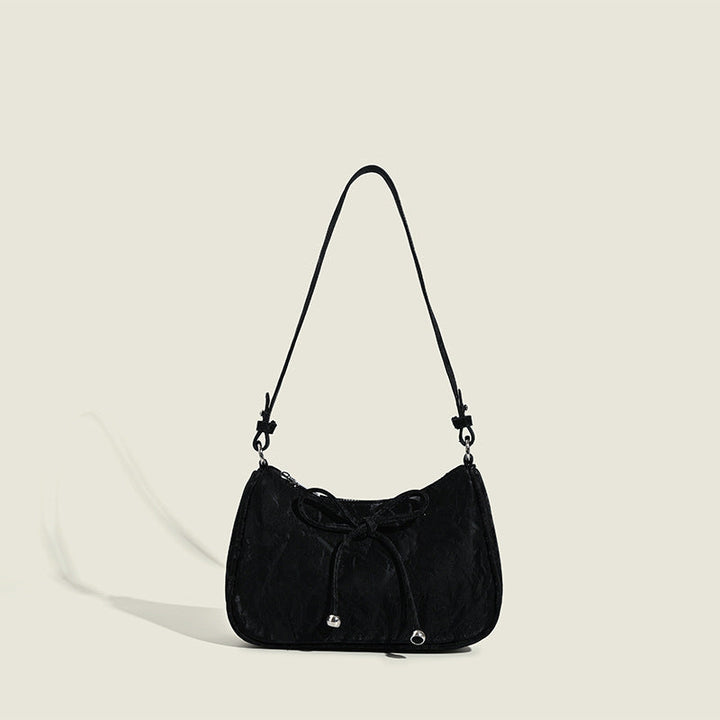 Ladies elegant mini handbag with playful drawstring