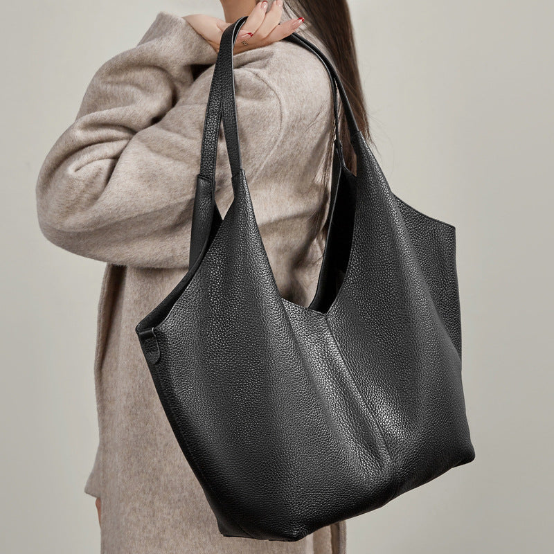 Women's tote bag in modern minimalist design with spacious interior layout