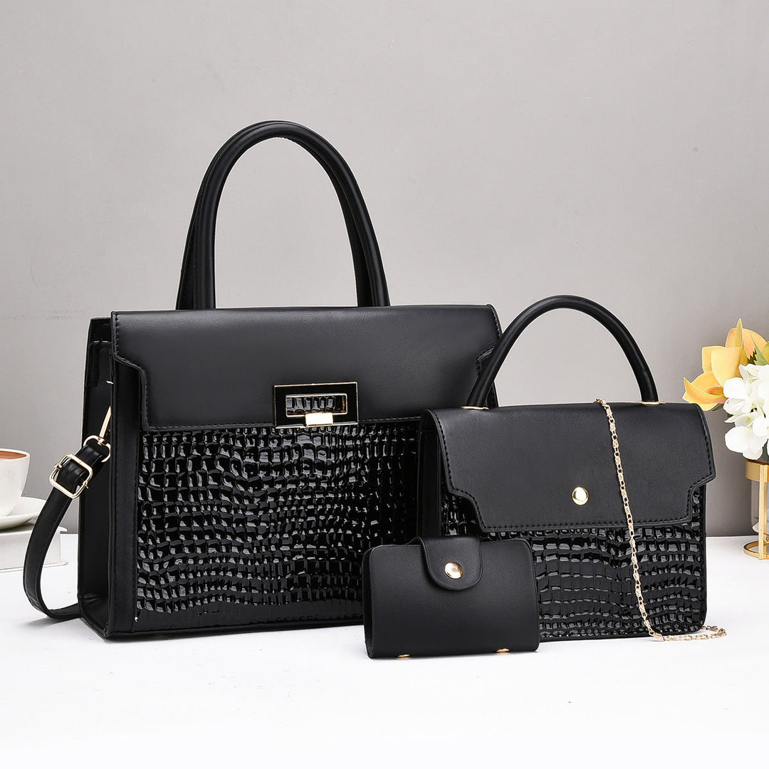 Ladies handbag set with luxurious crocodile leather look and removable clutch