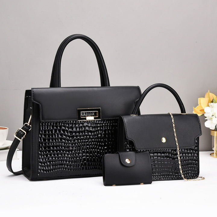 Ladies handbag set with luxurious crocodile leather look and removable clutch
