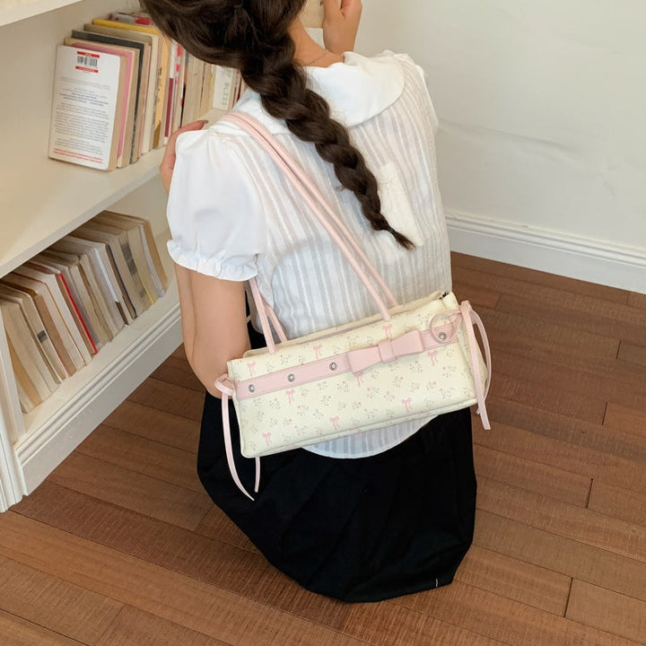 Women's crossbody bag with elegant fringe design