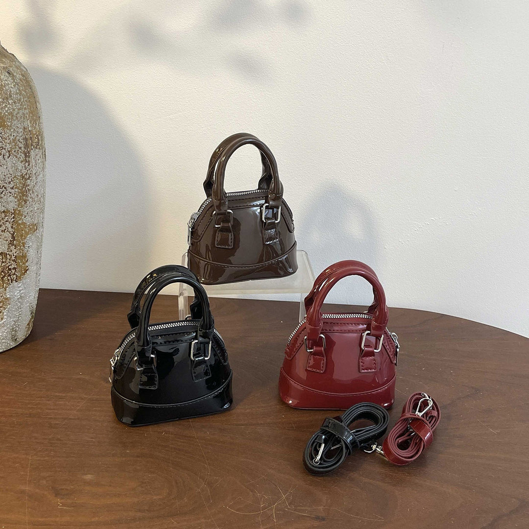 Women's mini handbag with glossy surface and fashionable zipper