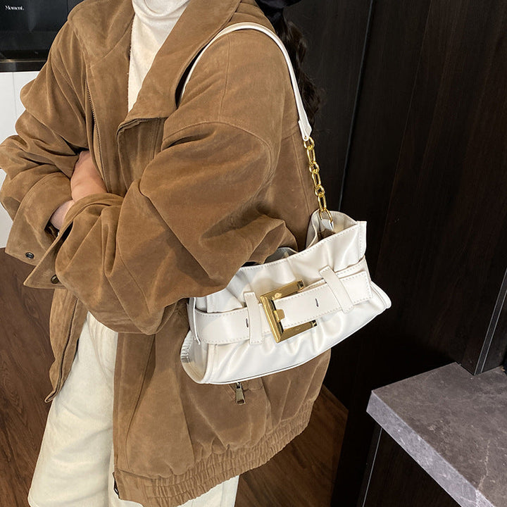 Women's crossbody bag with elegant chain accent and soft upper material