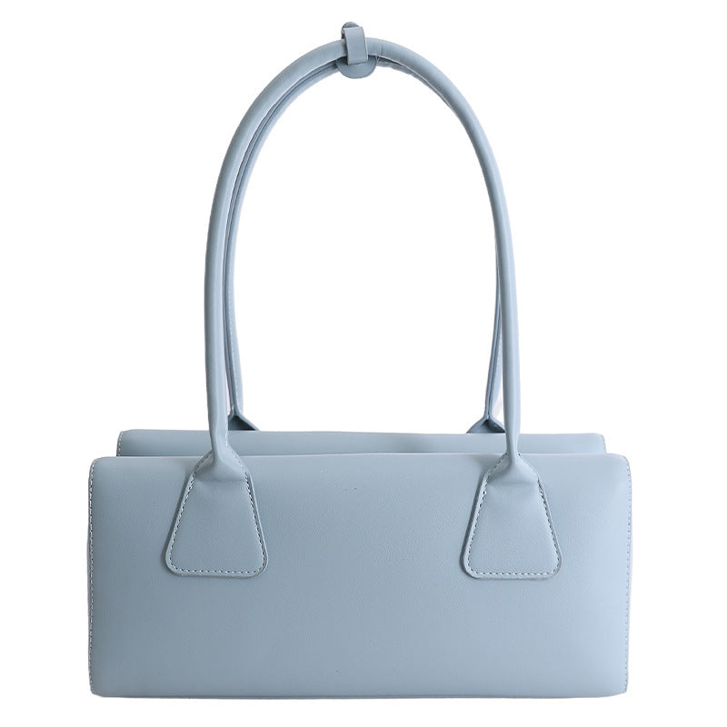 Ladies elegant handbag with minimalist silhouette