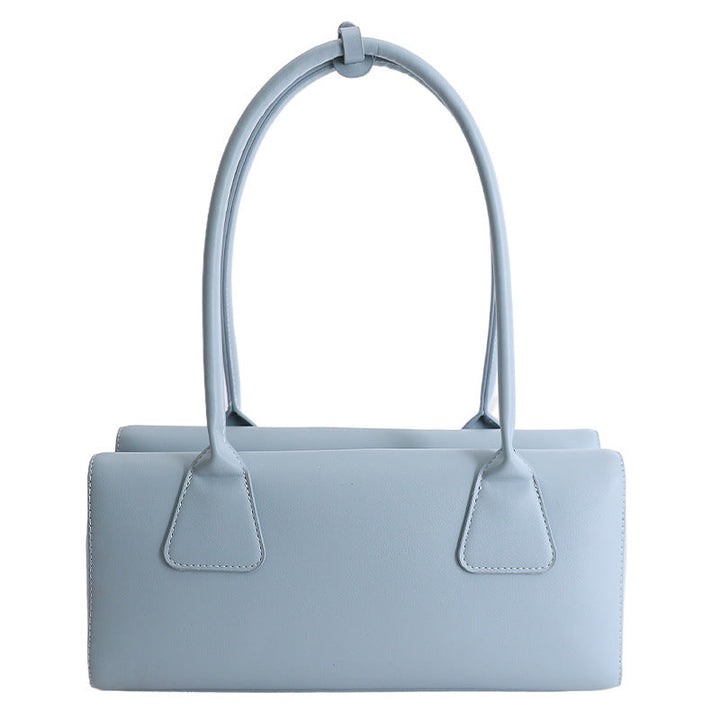 Ladies elegant handbag with minimalist silhouette