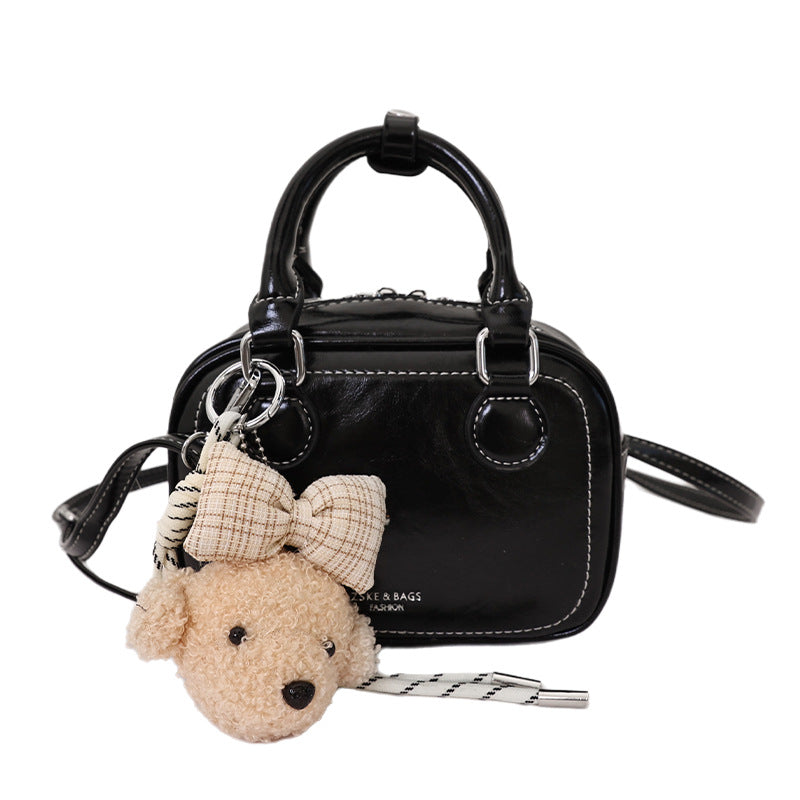 Women's mini handbag with detachable plush charm