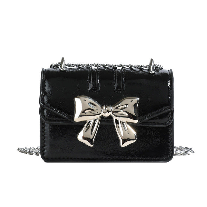 Ladies Mini Handbag with Shimmering Bow Closure