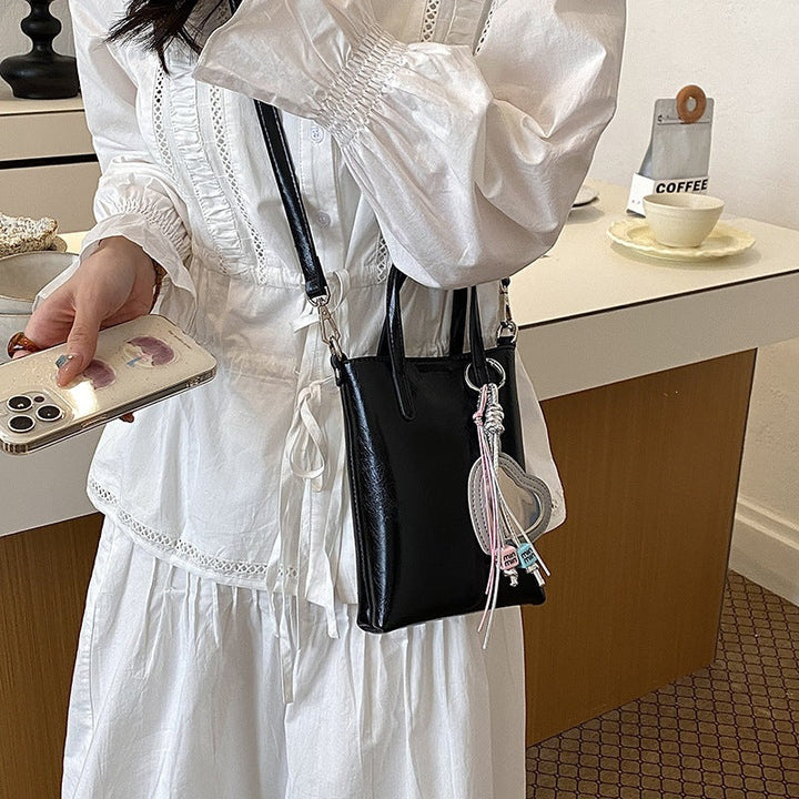 Ladies mini handbag with elegant pendant