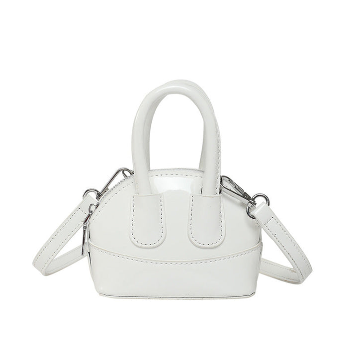 Ladies mini handbag with elegant glossy finish and removable shoulder strap
