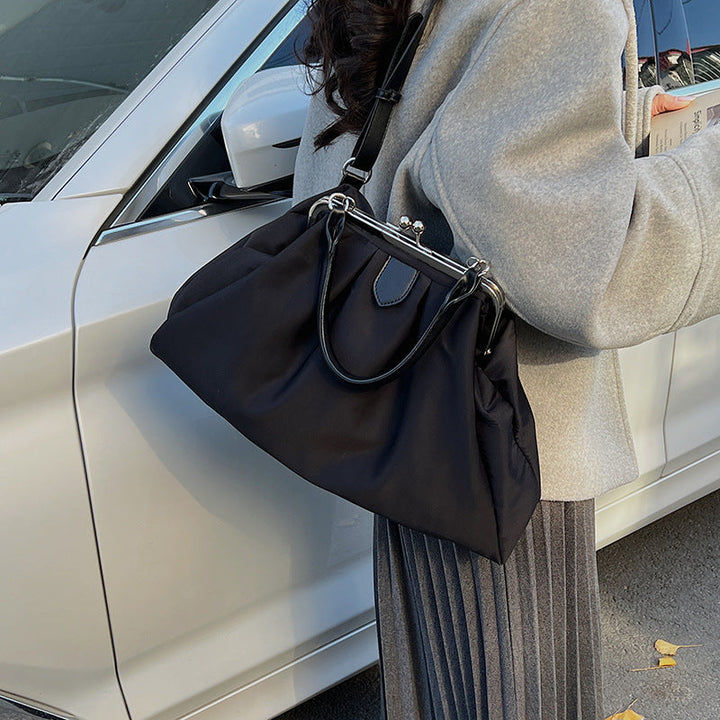 Women's large shoulder bag with elegant pleats and detachable shoulder strap