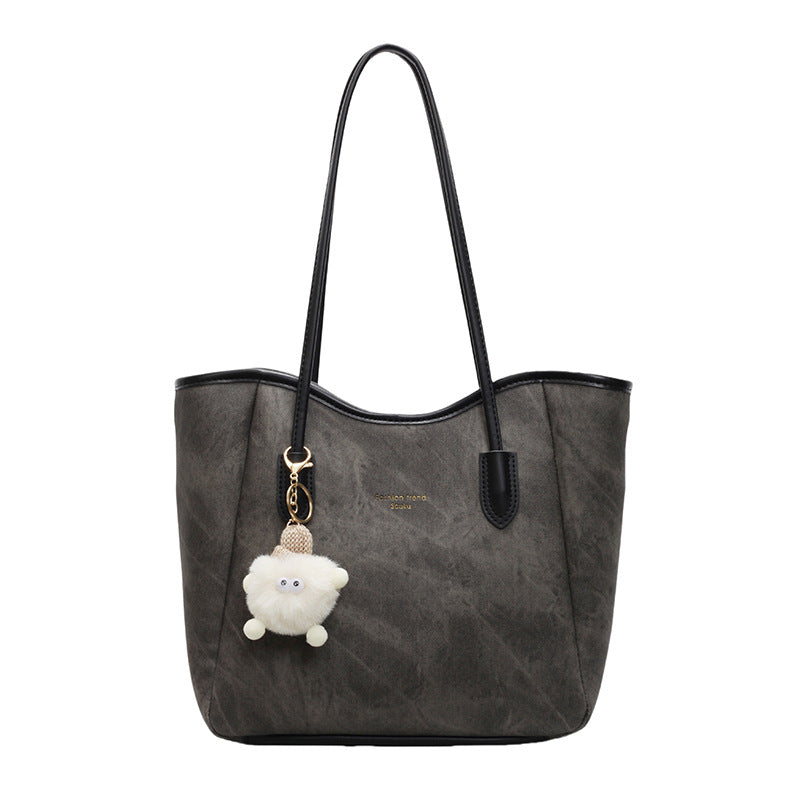 Women's Tote Bag with playful faux fur pendant