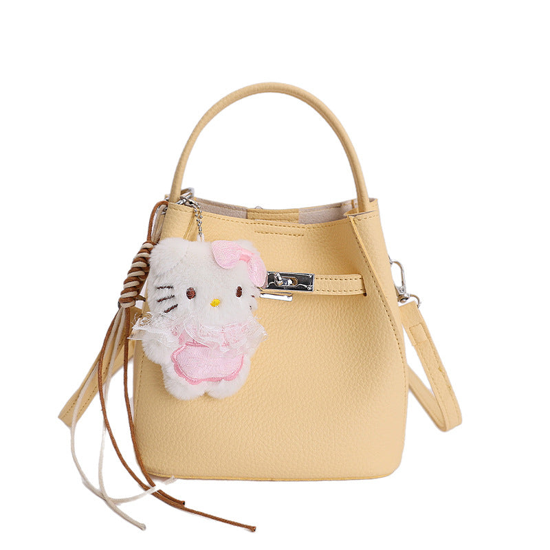Women’s mini bag with detachable plush pendant