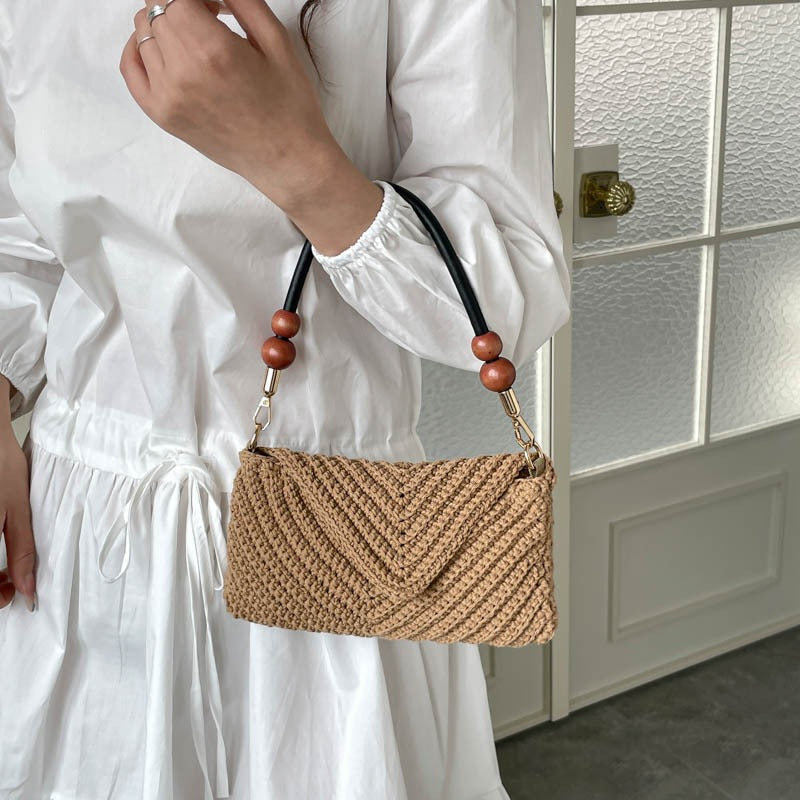 Ladies fashionable braided shoulder bag with wooden handle