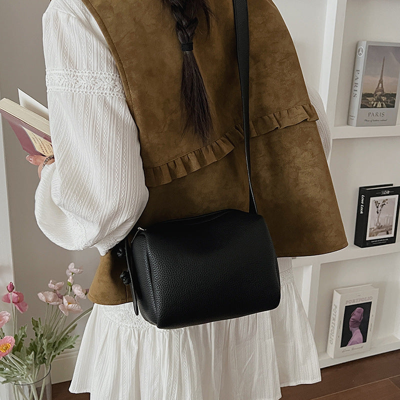 Women’s shoulder bag in modern design with structured surface