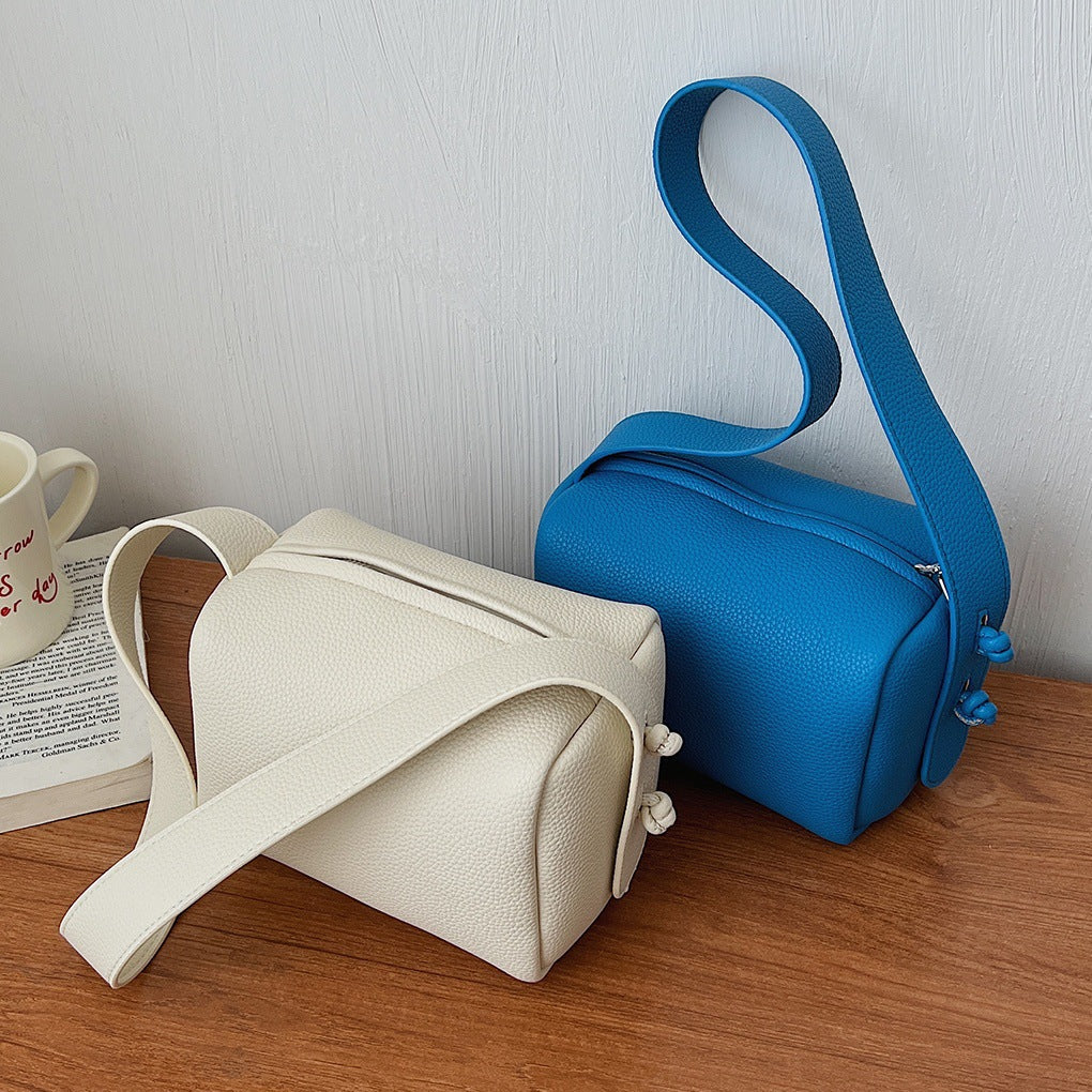 Women’s shoulder bag in modern design with structured surface