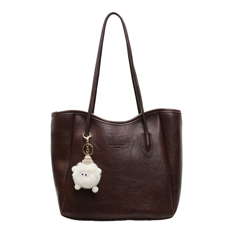 Women's Tote Bag with playful faux fur pendant