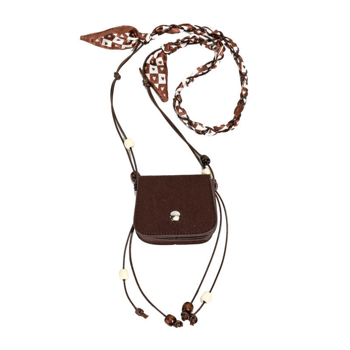 Women's mini handbag with adjustable chain strap and customizable design