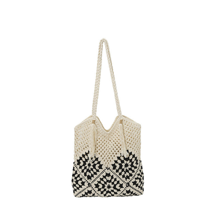 Ladies crocheted shoulder bag with playful sunflower appliqués